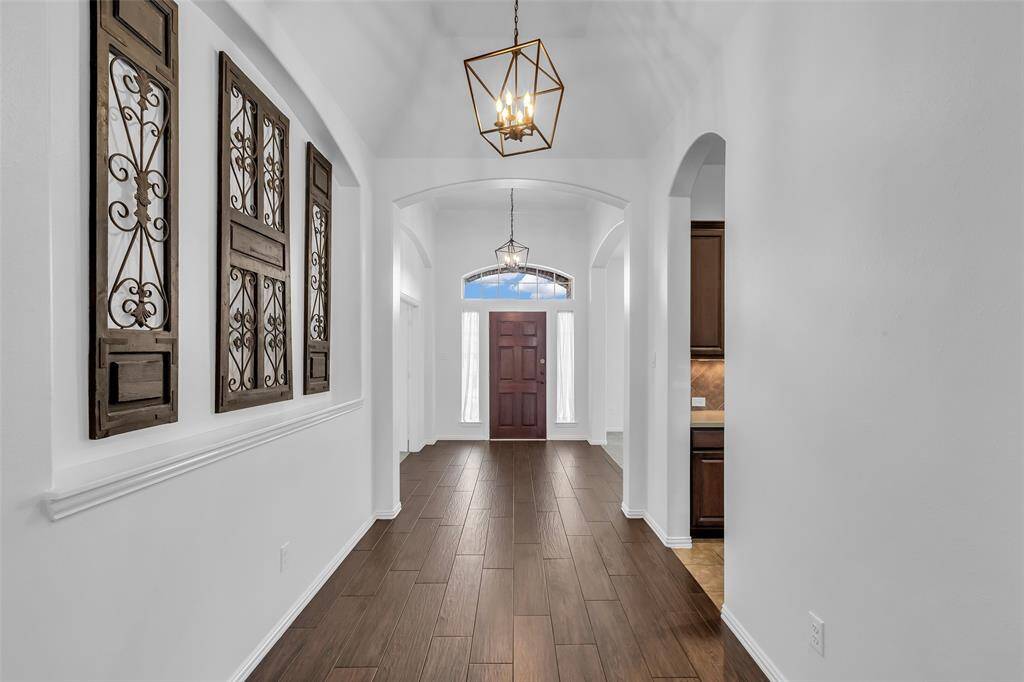 Spacious Foyer with Updated Fixtures through out.
