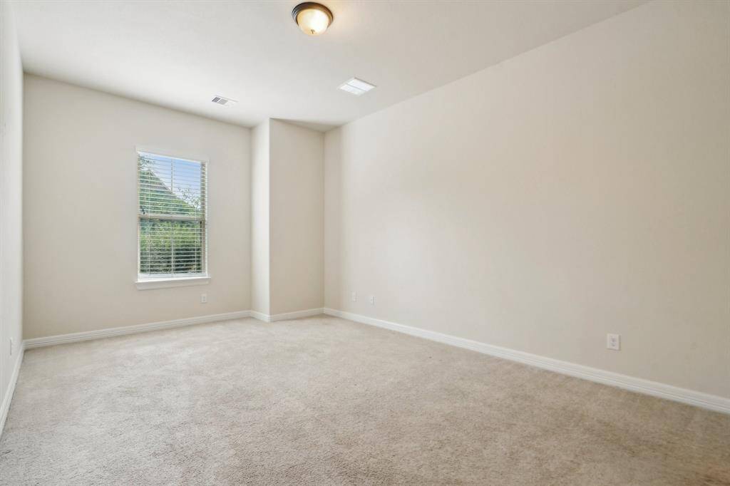 Secondary downstairs bedroom is large and comfortable and tucked away.