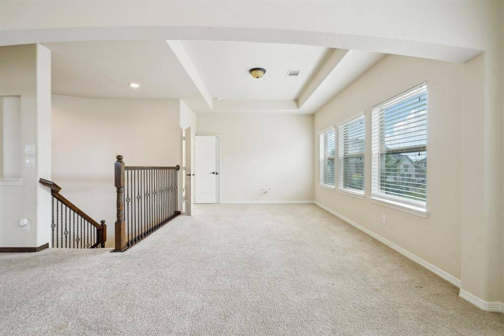 This huge game room can be divided up into multiple spaces offering fun for everyone.