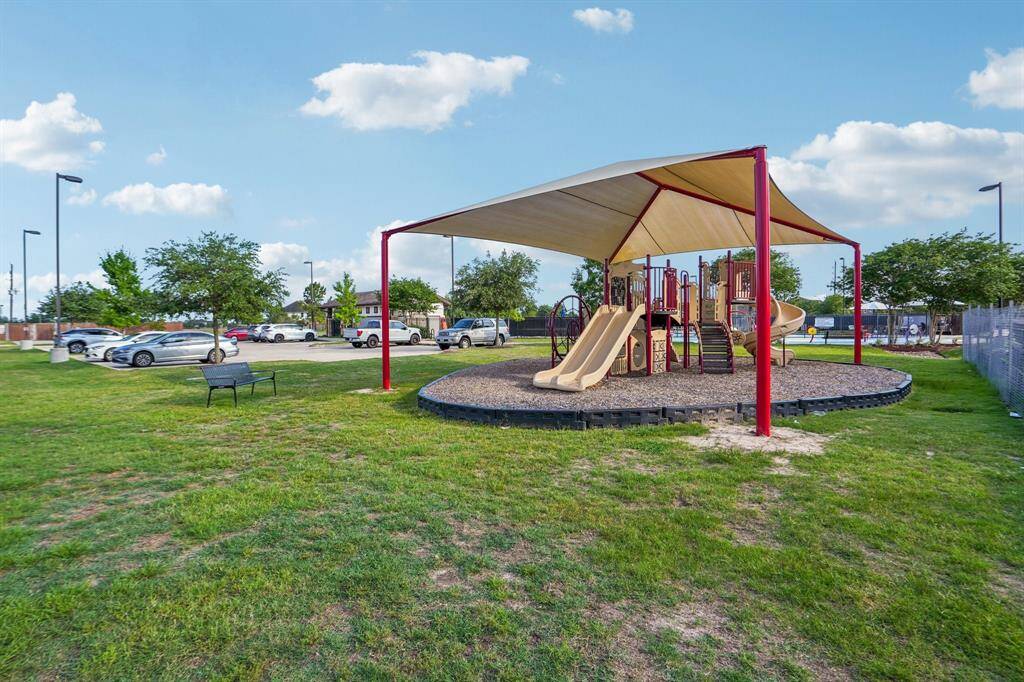 Playground is covered for shade.