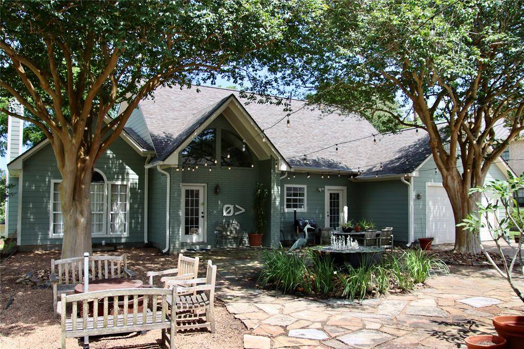 Welcome home to this serene riverfront retreat, complete with a guest house, 100 feet of water frontage, a private pool, a double-level dock with an outdoor kitchen, two boat lifts, and a guest boat slip.