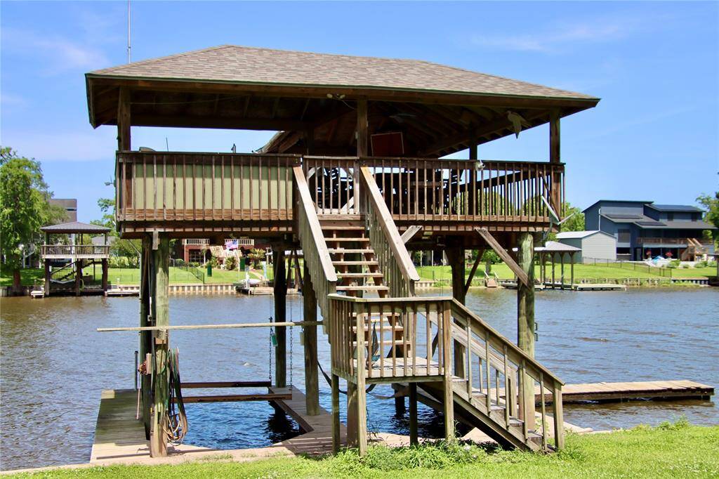 This double-level dock with covered lounge is your front-row seat to riverfront living—ideal for fishing, relaxing, or soaking in the breeze.
