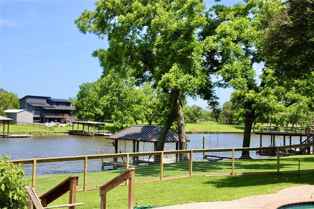Soak in expansive river views from your fully fenced backyard—ideal for morning coffee or an afternoon of lounging.