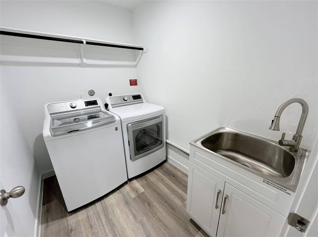 Laundry Room with a sink