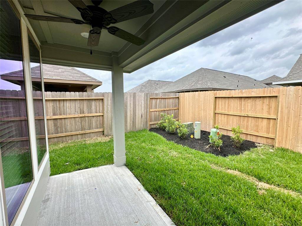 Spacious covered backyard.