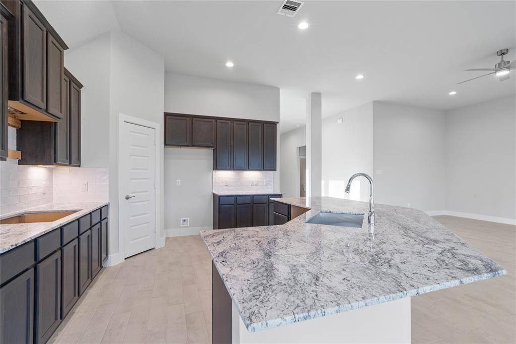 This photo is for illustrative purposes only and is not to be considered an exact replica of the finished home. Rendering does not match the finished product in terms of features, colors, landscaping, etc. Pricing, specifications, square footage and materials are subject to change at any time and without notice.