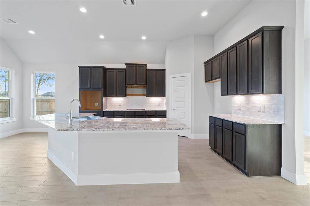 This photo is for illustrative purposes only and is not to be considered an exact replica of the finished home. Rendering does not match the finished product in terms of features, colors, landscaping, etc. Pricing, specifications, square footage and materials are subject to change at any time and without notice.