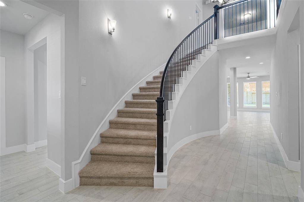 This photo is for illustrative purposes only and is not to be considered an exact replica of the finished home. Rendering does not match the finished product in terms of features, colors, landscaping, etc. Pricing, specifications, square footage and materials are subject to change at any time and without notice.