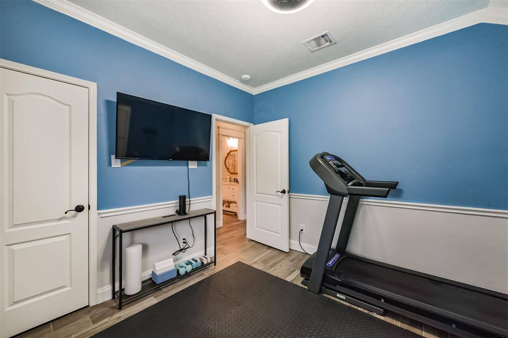 Third bedroom or versatile flex room with a built-in closet.