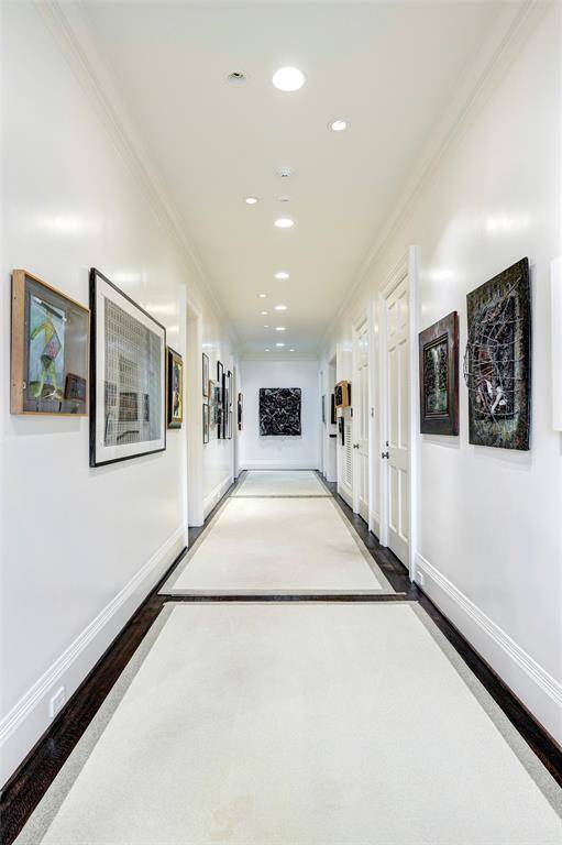 Second floor hall, access to elevator, bedrooms and guest quarters.