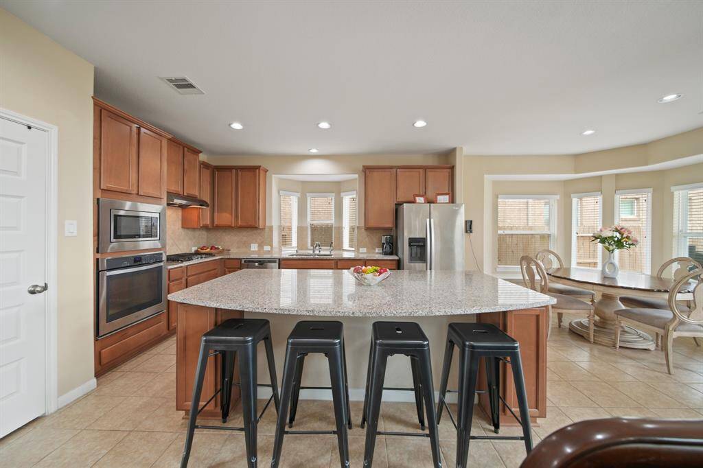 Kitchen is open to the family room- great for entertaining.