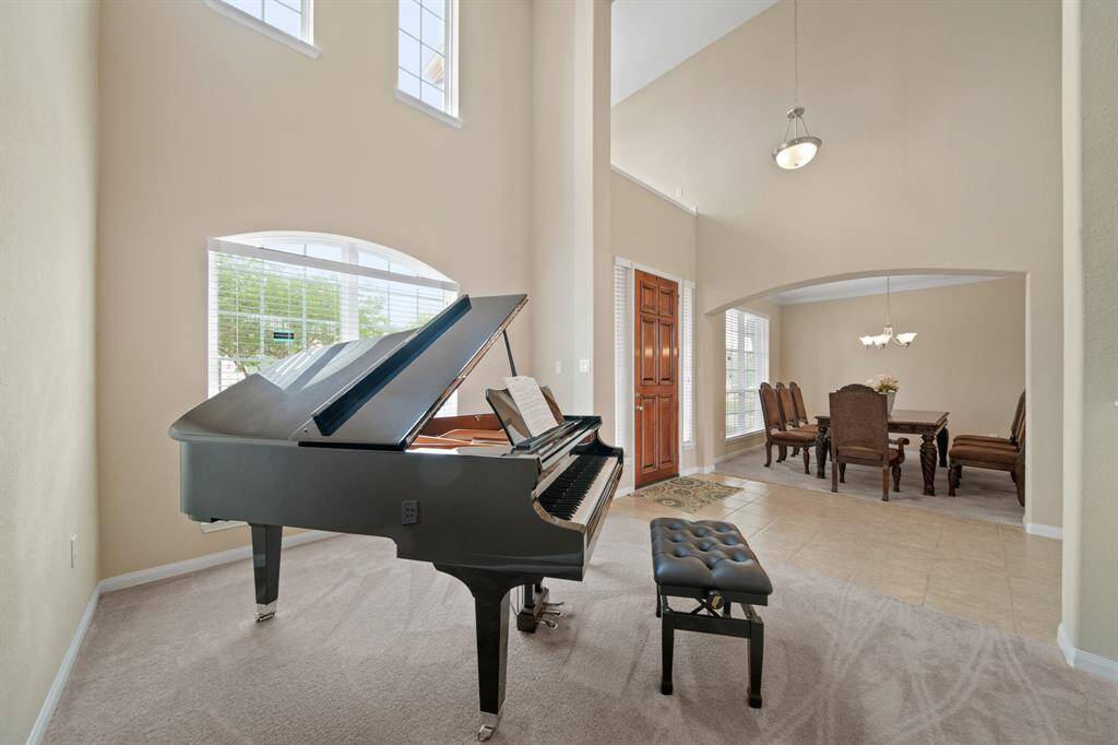 NEW VINYL COMING!Soaring ceilings throughout