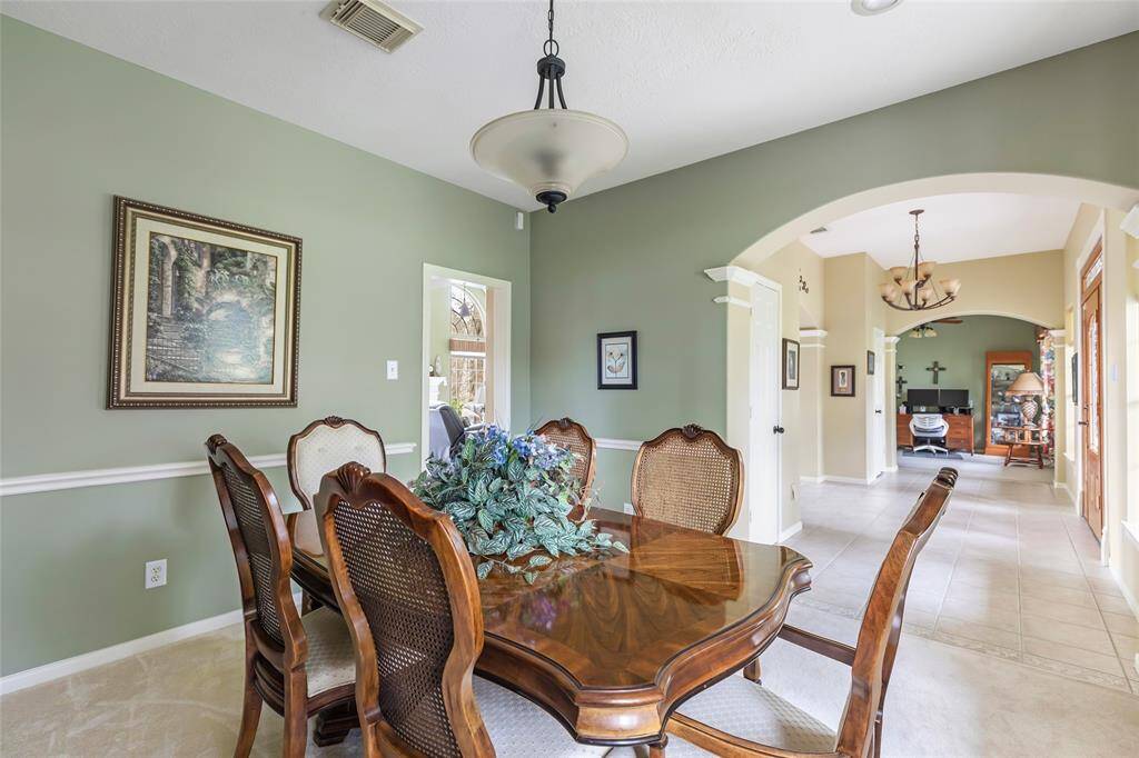 Dining area will fit oversized table with 8 chairs...