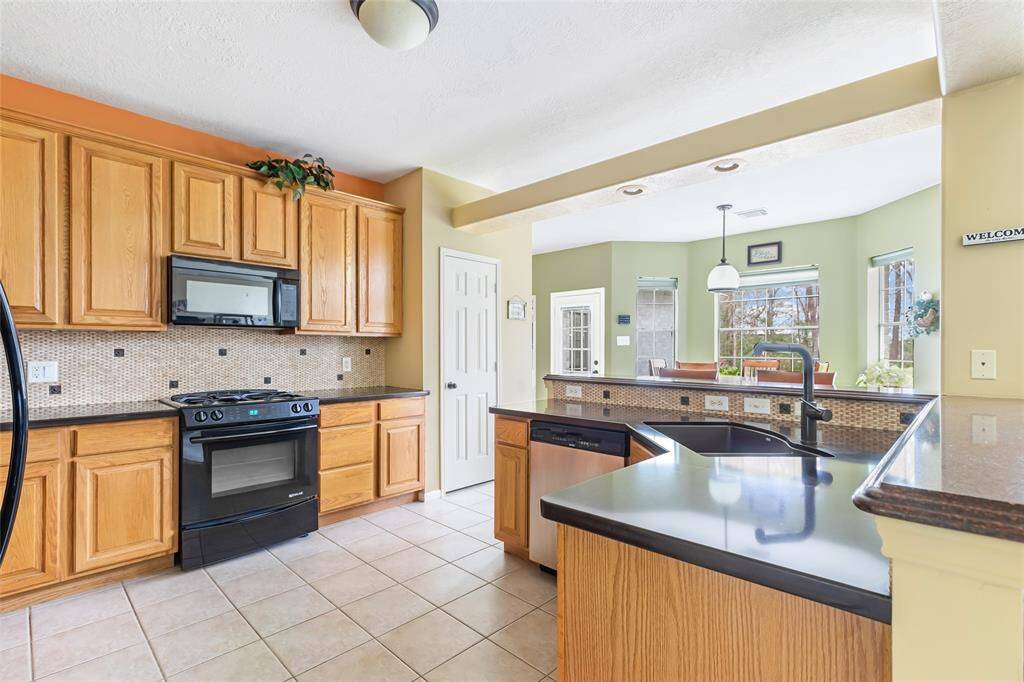 Time for the new Chef... Jenn-Air appliances, nice storage & walk in pantry... Home has a water softener system...