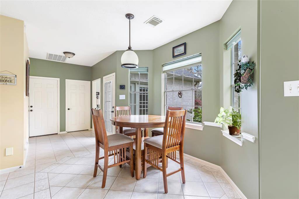 Breakfast area overlooks backyard...