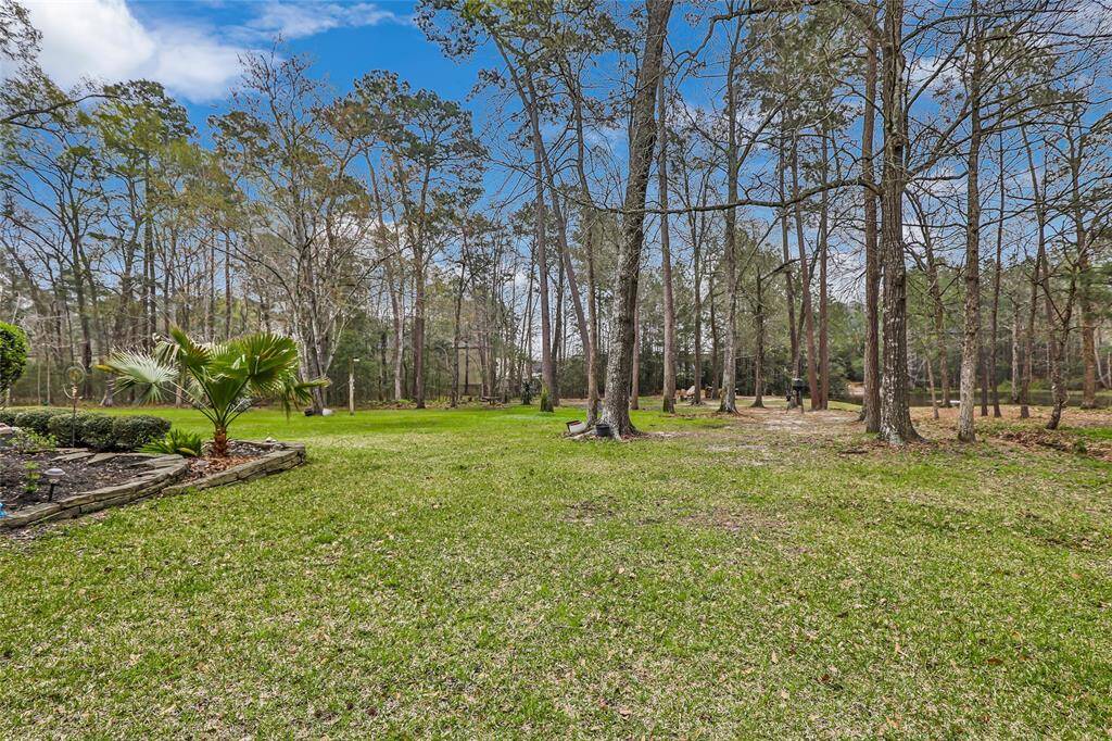 The back yard has plenty of room for building a RV garage/storage building, or adding a pool...