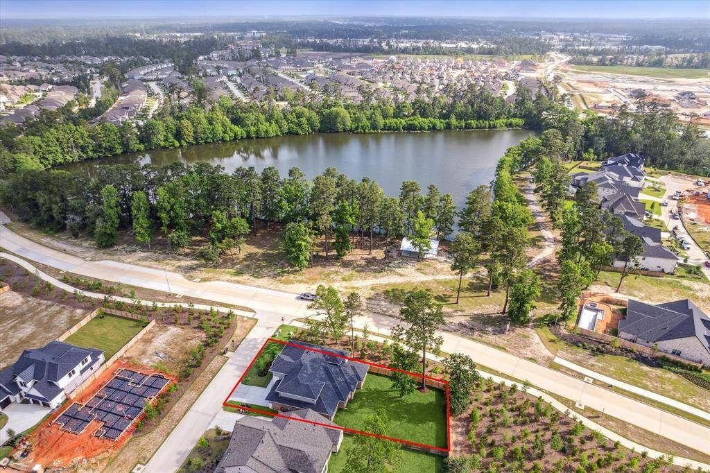 Steps away from Deer Lake, 403 Venado View Ct, sits on a premiere, corner lot - no neighbors to the back or north.