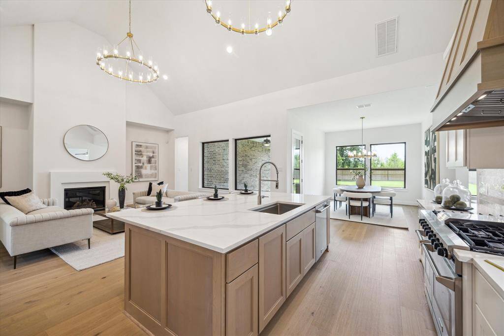 Harminous flow between Kitchen, Living, and Dining Areas