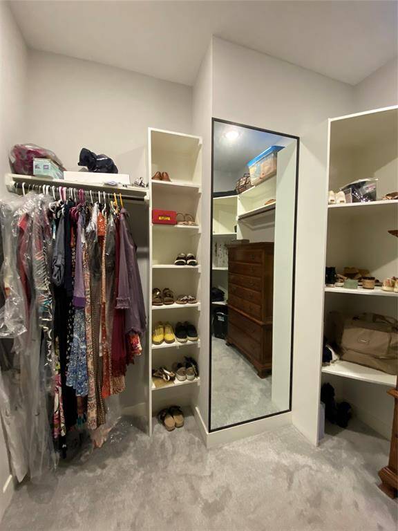 Primary closet for HER is extra large - see all 3 photos. Shoe cubbies, full length mirror