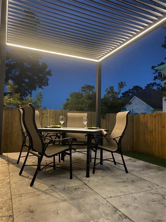 Lovely setting for evening dinners. Table remains on site as it coordinates with the stamped concrete.