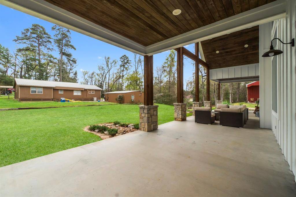 this back porch was built for entertaining!