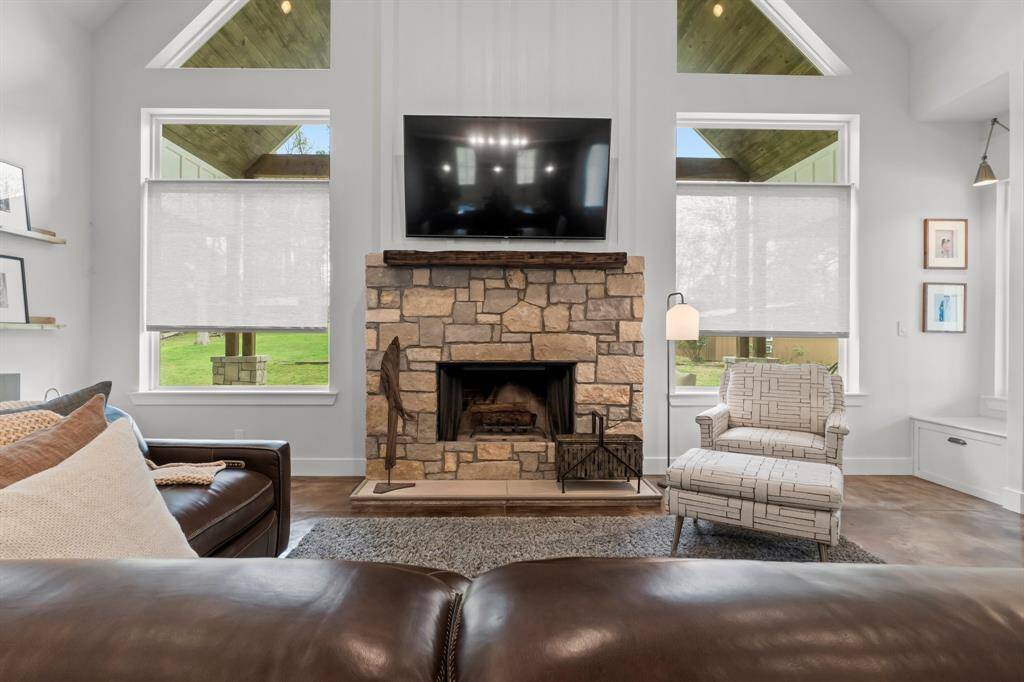 wood burning fireplace with great picture windows!