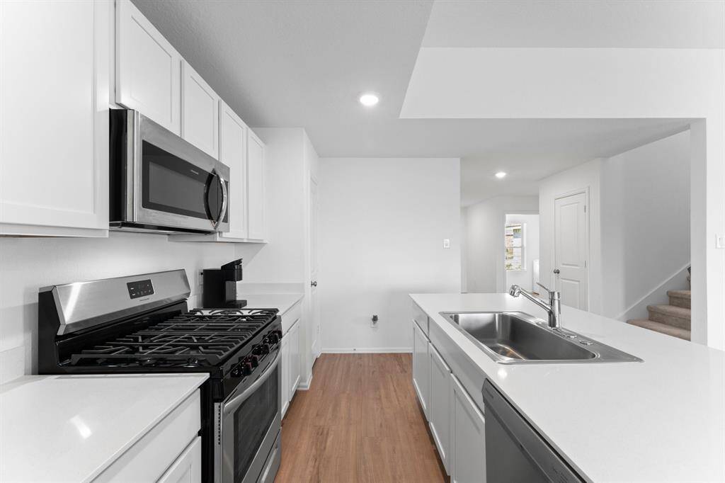 Stainless steel appliances, plus an oversized single bowl sink!