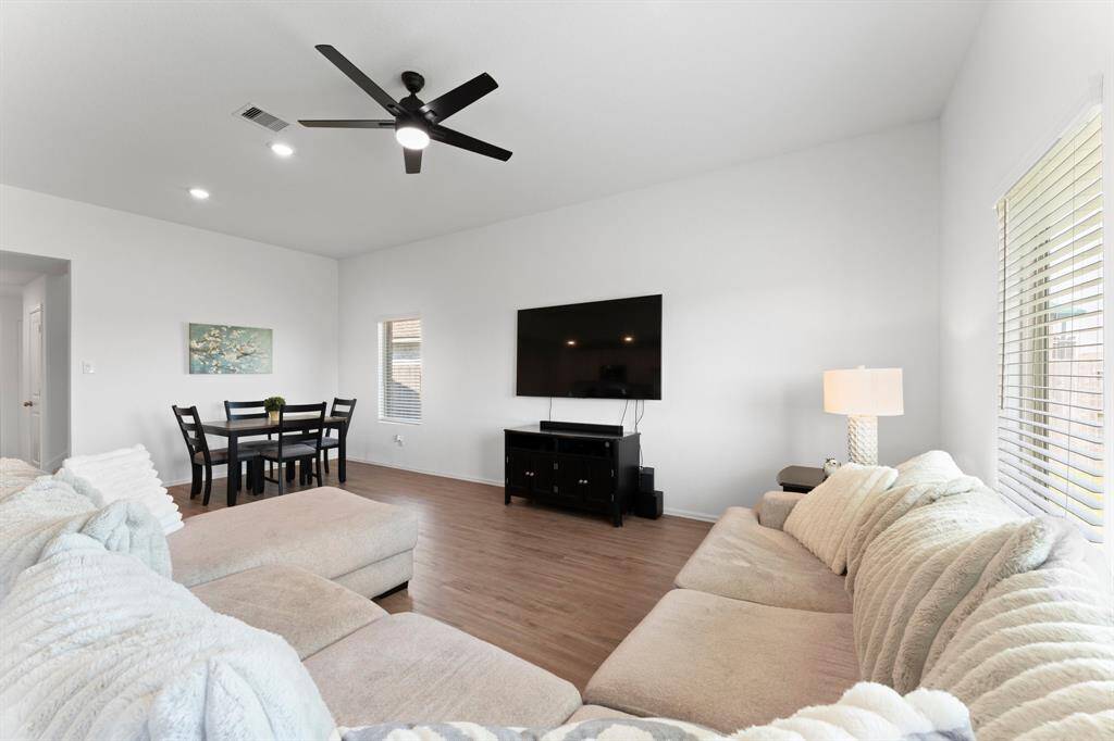 Clean crisp light colored walls provide a lovely contrast to the beautiful LVP flooring!