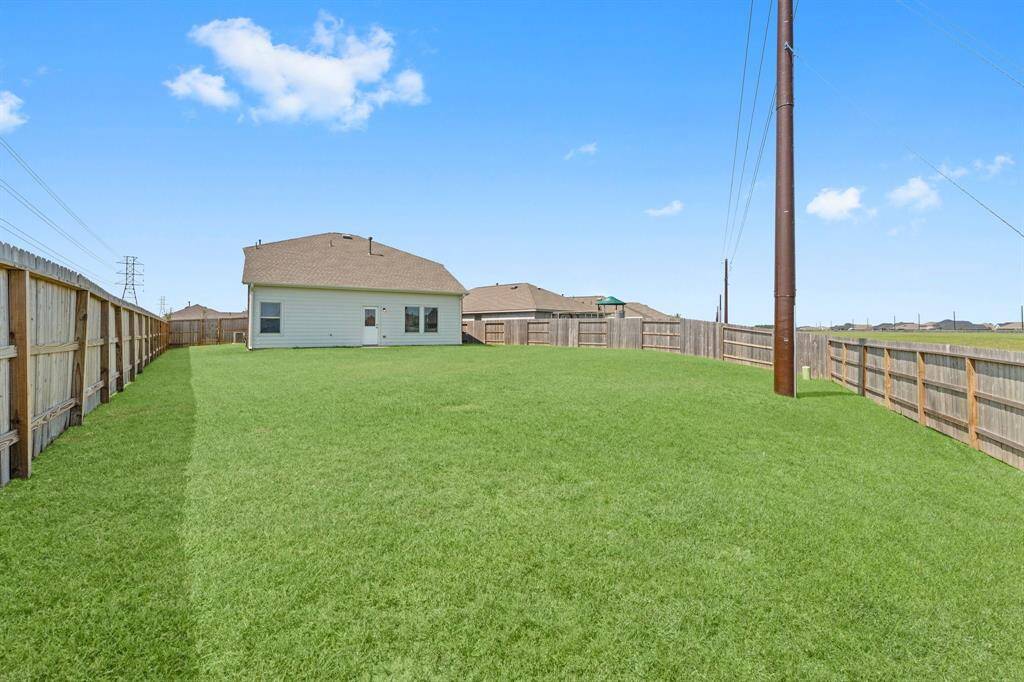 This oversized lot is truly impressive! Endless possibilities!