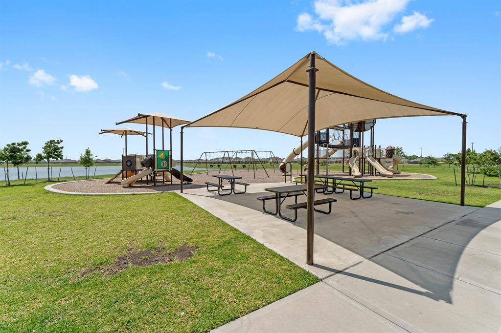 Tents for cool outdoor relaxation overlooking the beautiful lake and playground areas!