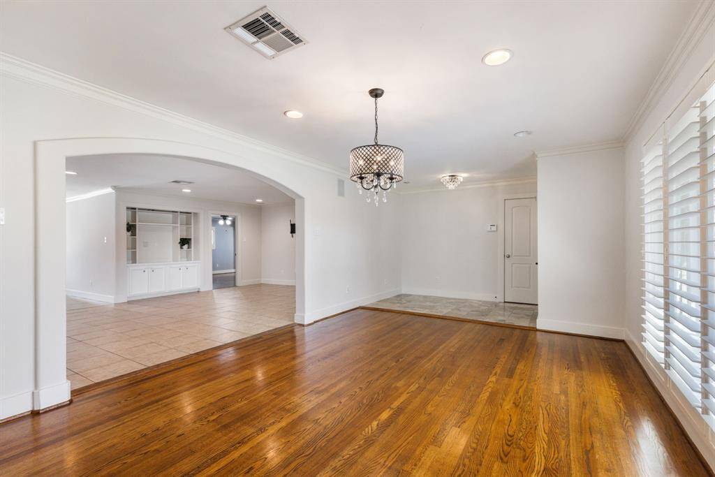 The dining room is open to the main living space for easy access while still maintaining a sense of privacy.