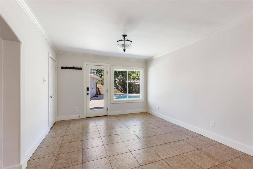 This corner of the room offers convenient access to your private pool, along with relaxing views of the pool area.