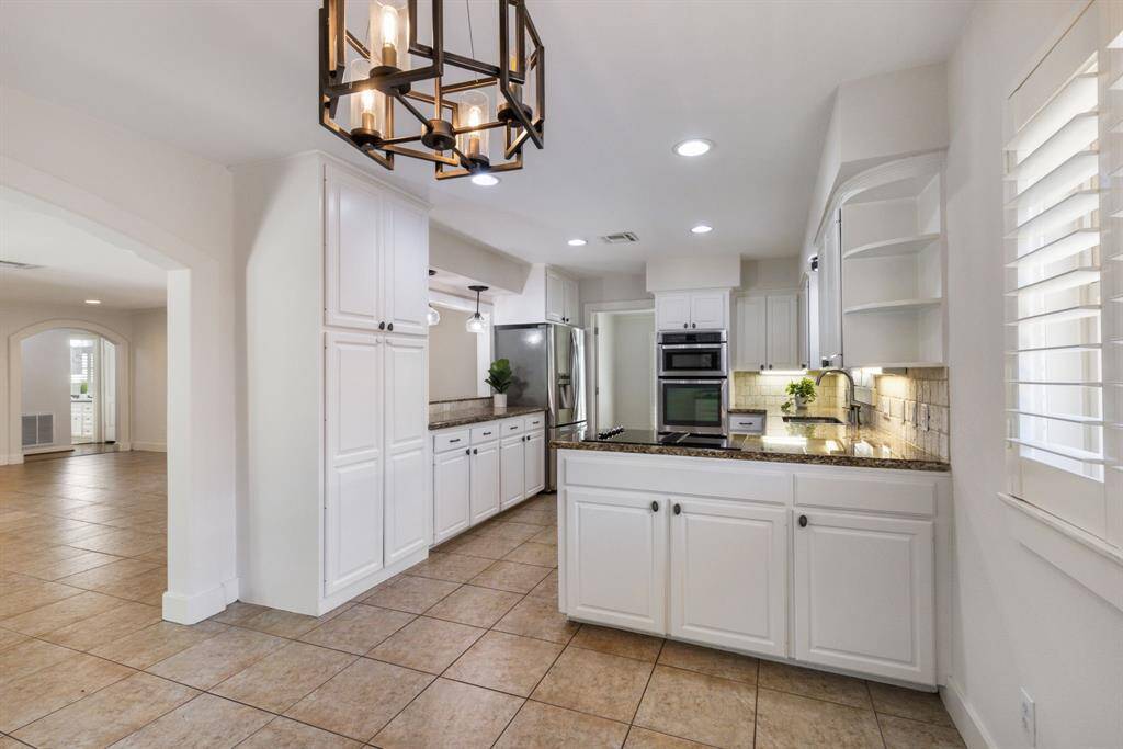 Subtle touches throughout the home, like the carefully chosen lighting, enhance and elevate the space.