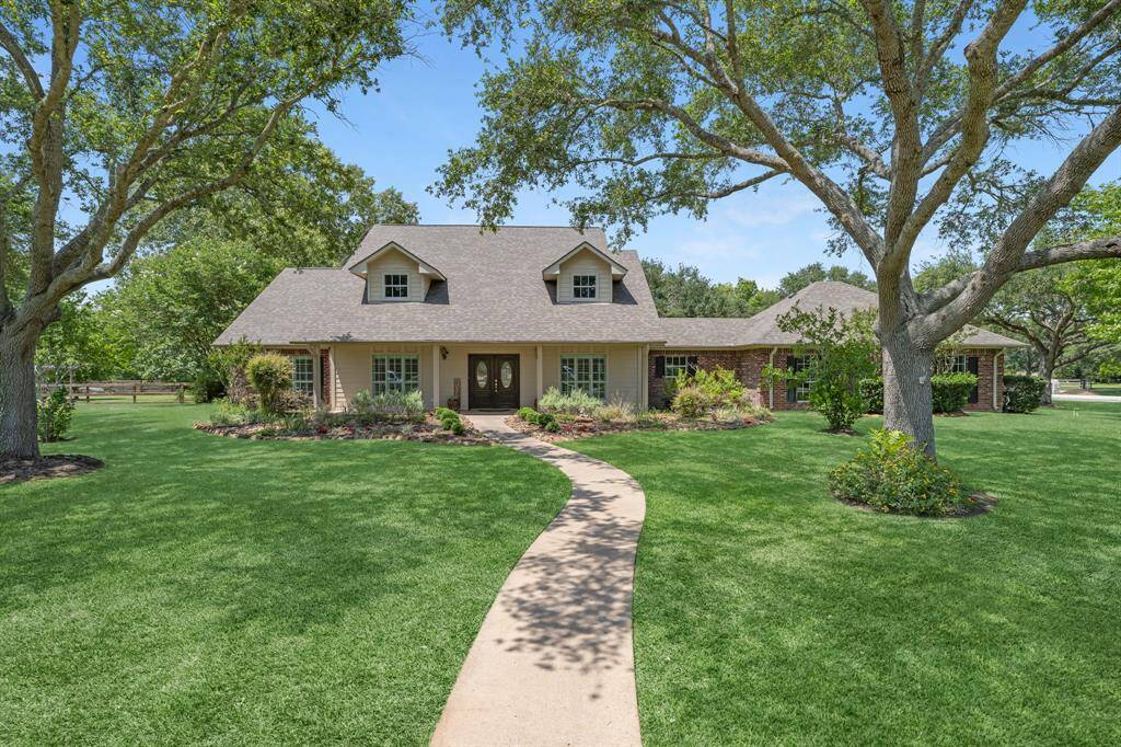 Welcome to 4402 Winding River Drive – a spacious four to five-bedroom, three-and-a-half-bathroom home set on 1.34 acres of beautiful land. Surrounded by towering trees, this property offers the perfect blend of privacy, space, and natural beauty.