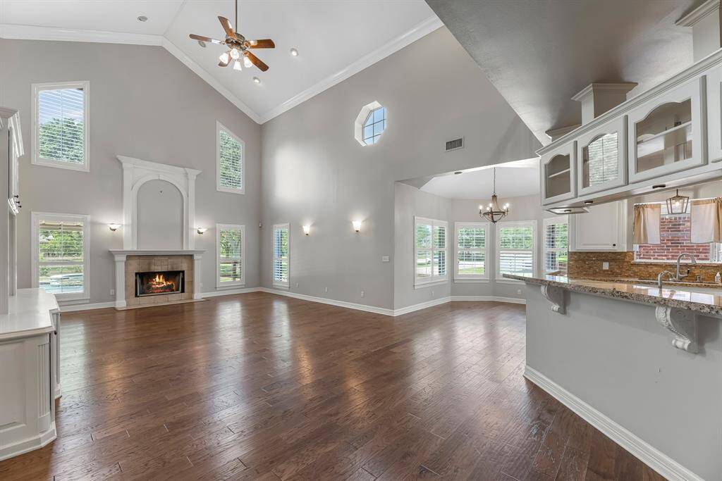 Enjoy the ease of open-concept living, where the kitchen, breakfast area, and living room flow effortlessly together—perfect for everyday living and entertaining alike.