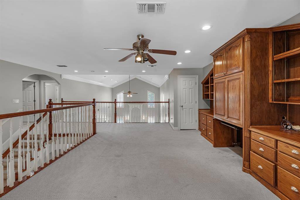 This versatile game room offers endless possibilities—as a playroom, entertainment hub, casual lounge, or home office—making it the perfect adaptable space for your lifestyle.
