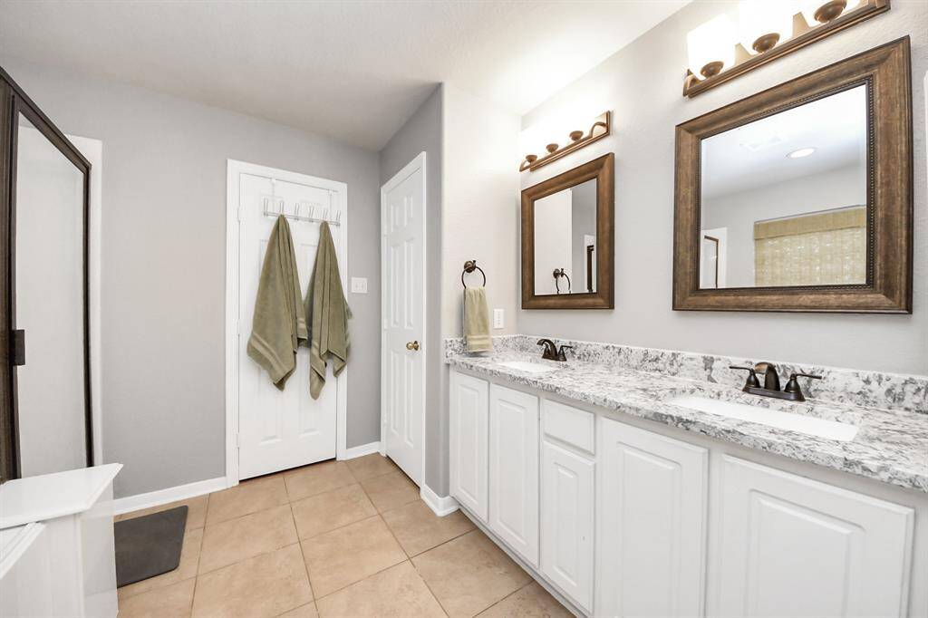 Granite countertops in bathrooms, framed mirrors and new fixtures!