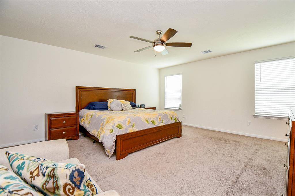 Here’s another view showcasing just how large and open the primary suite truly is, providing plenty of room to create your perfect retreat.