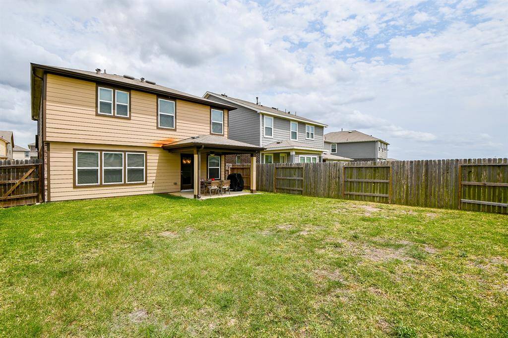 This final view truly showcases just how expansive the backyard is—offering an incredible amount of space for outdoor living, future projects, or simply enjoying the open air. It’s a standout feature of this property you won’t want to miss.