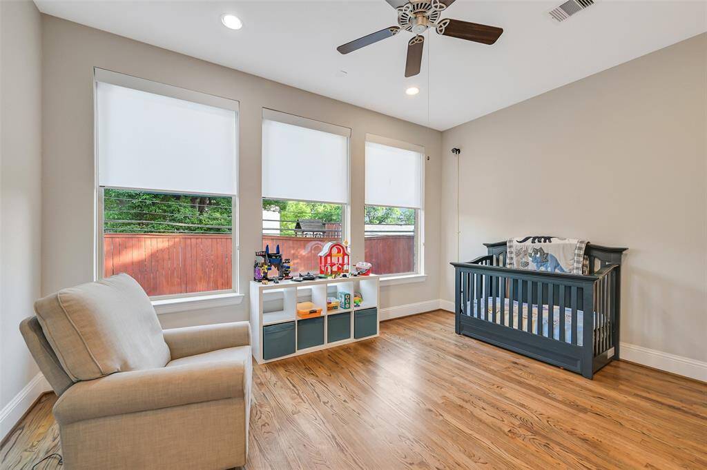 This secondary den or additional study is off the kitchen area. The current owners used it as a nursery.