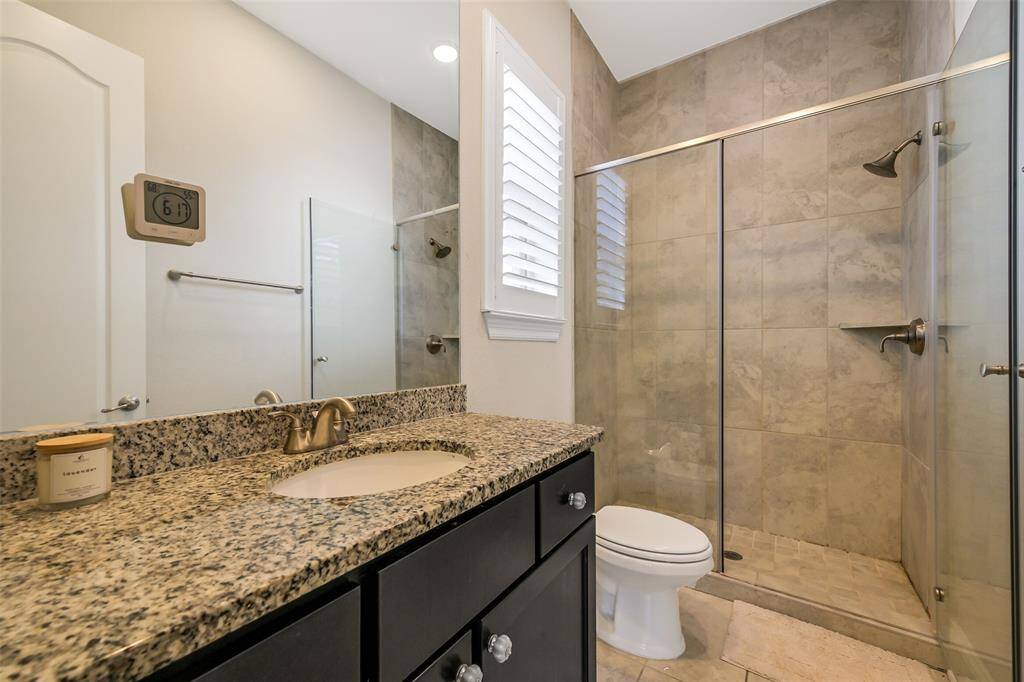 This is the bath for the first floor secondary bedrooom.