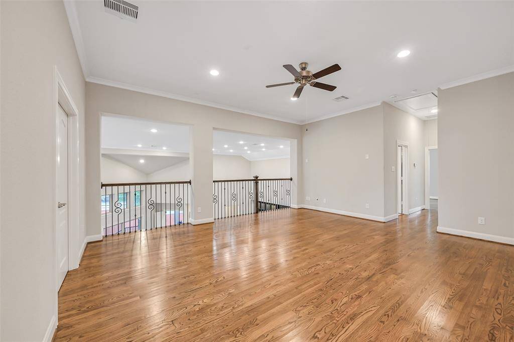 The game room is located at the top of the stairs and offers ample space for toys, games, a pool table and more!