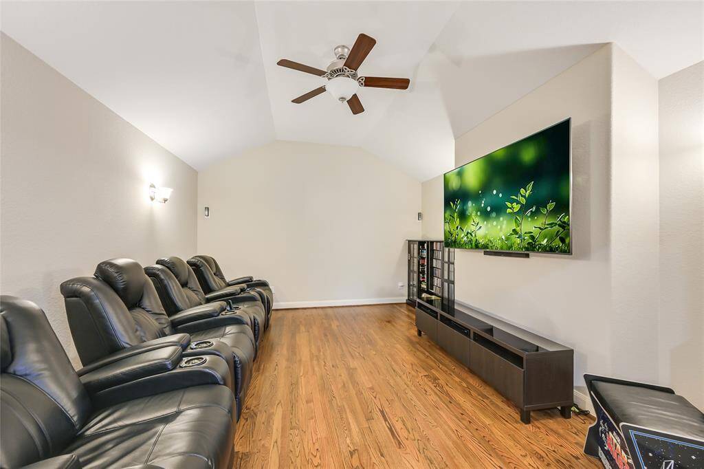 The media room is off the game room and is wired for surround sound.