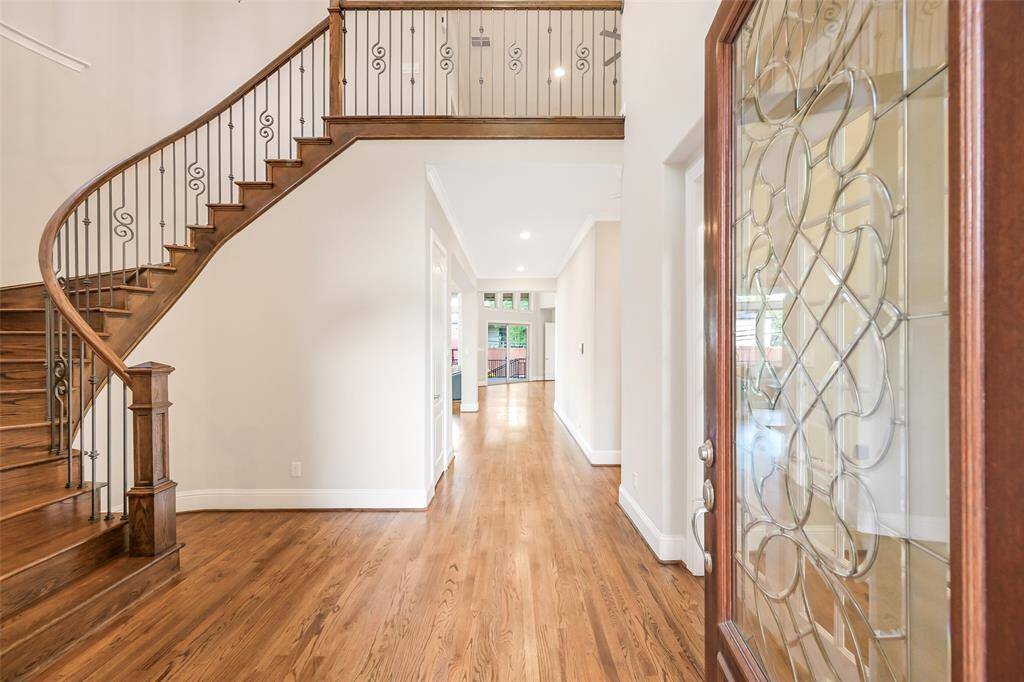 Traditional hardwood floors are featured throughout the home. Two story ceilings in the entry, study and family room bring in loads of natural light.
