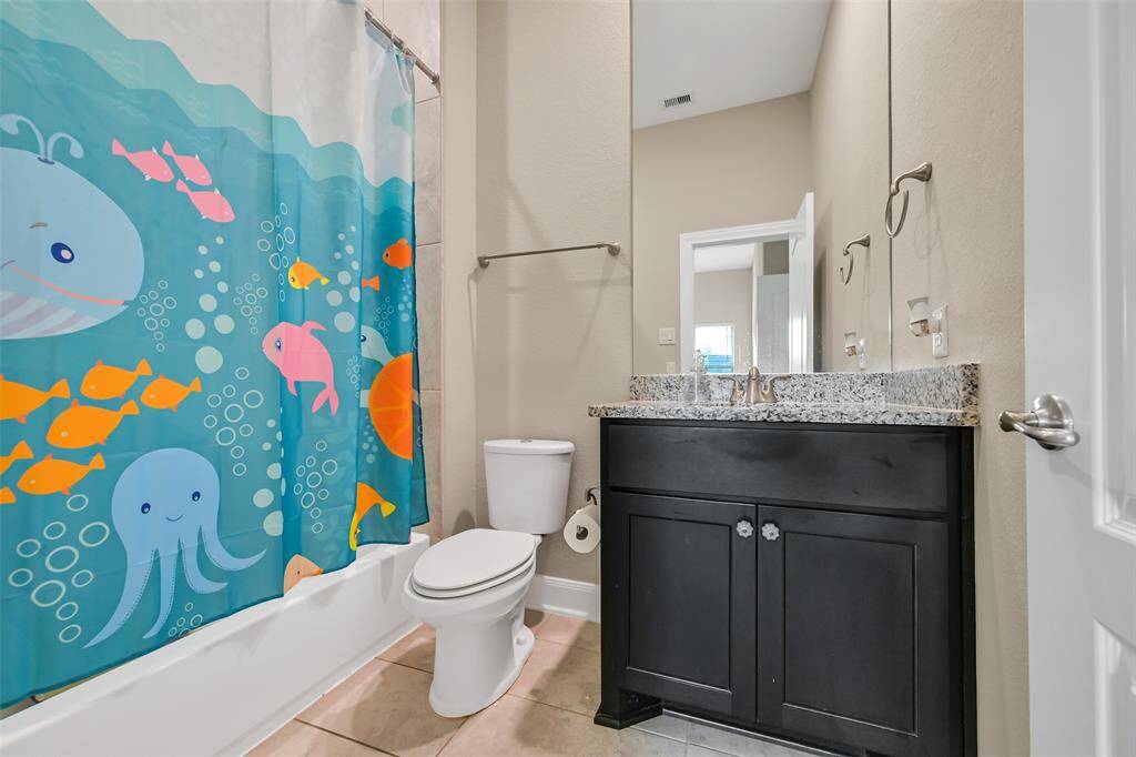 This is the bath for bedroom three with a tub/shower combination