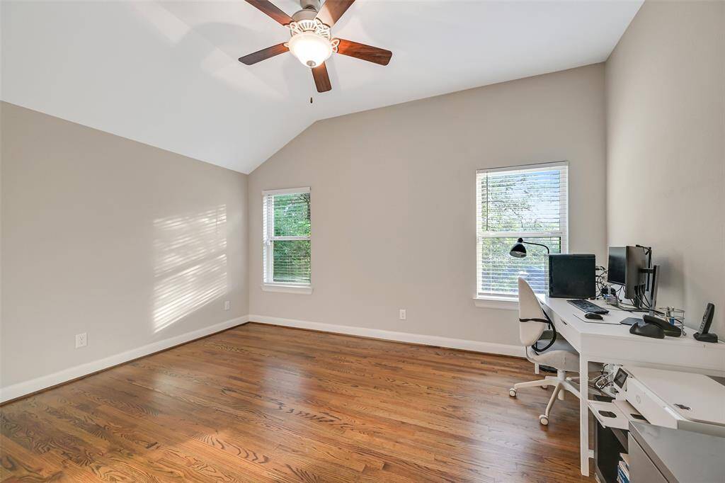 Bedroom four is currently being used as a private office space.