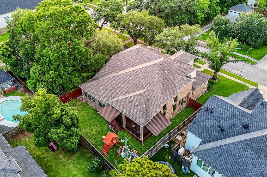 Another view from above shows the expansive yard space.