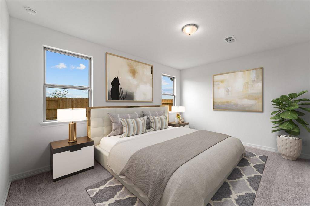 The primary bedroom is generously sized, creating a tranquil and spacious retreat that offers ample room for relaxation. Featuring plush carpet, high ceilings, fresh paint, and large windows that lets in natural lighting throughout the day.