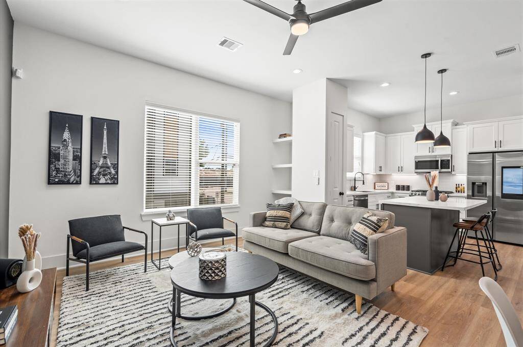 The second level of this home welcomes you with an open-concept kitchen, living, and dining space. This seamless transition between the common spaces of the home, create the perfect setting for gatherings and making memories! *All interior photos are from the model home: 5216 Pine Tree.*