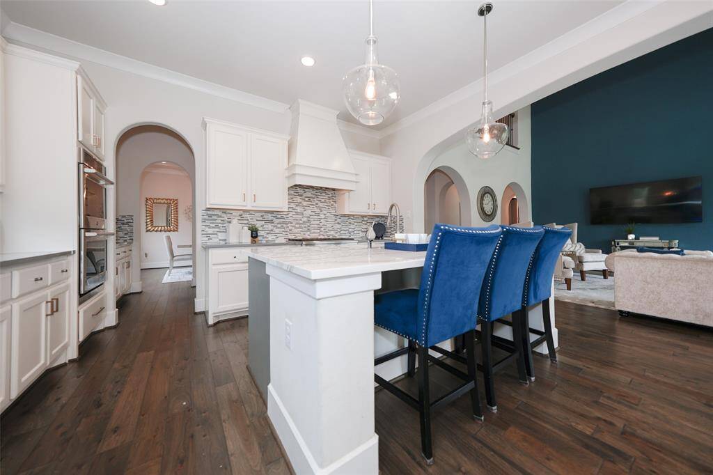 This stylish kitchen island offers extra seating for entertaining and convenient breakfasts.